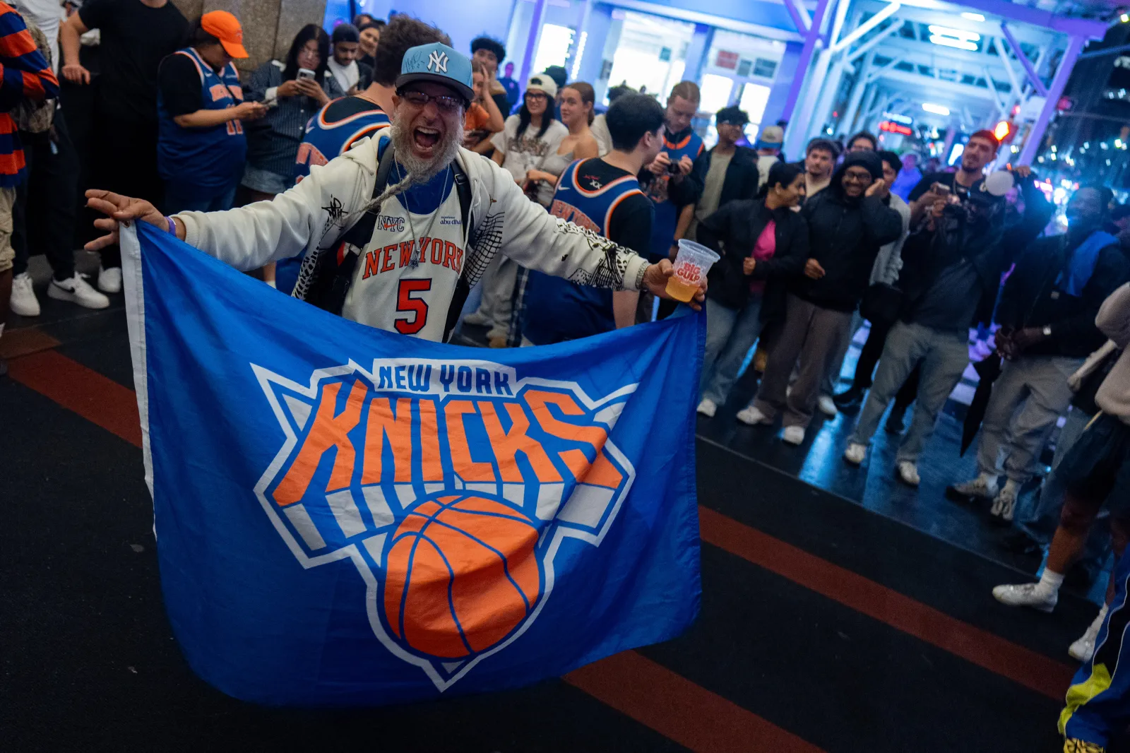 Knicks fans celebrate winning the eastern conference championship against the Cleveland Cavaliers on May 25, 2026 in New York City. The Knicks last reached the NBA Finals in 1999, falling to the Spurs, and are seeking their first championship since defeating the Lakers in 1973. (Photo by David Dee Delgado/Getty Images)