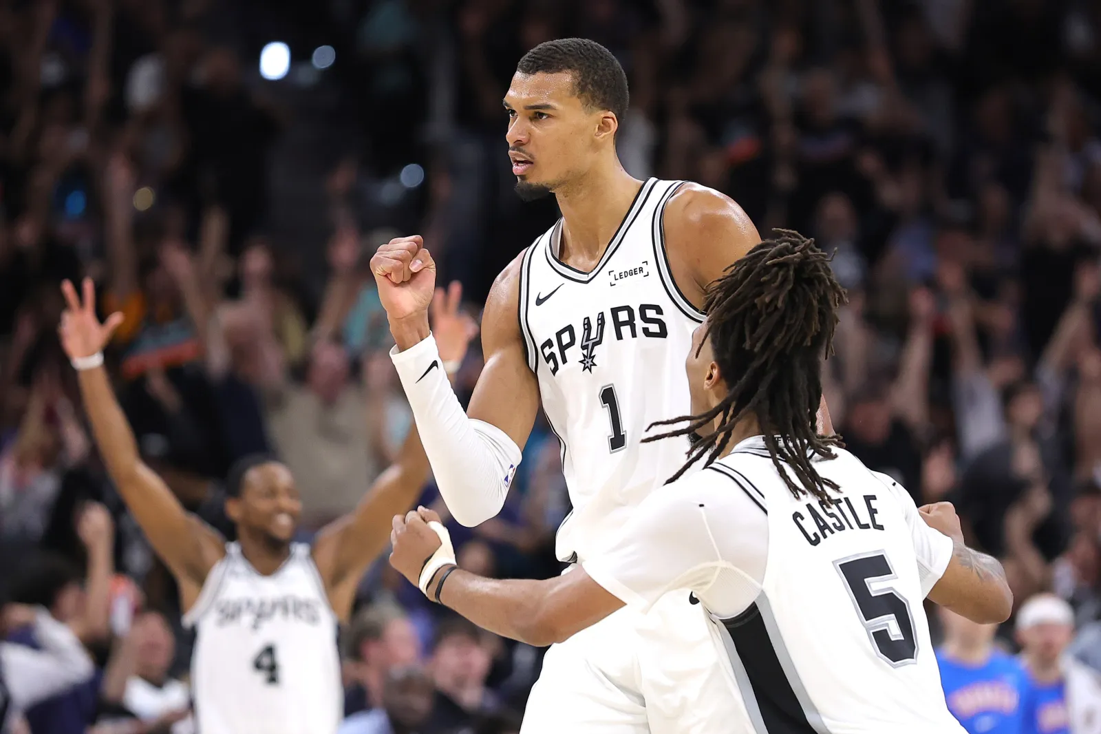 SAN ANTONIO, TEXAS - MAY 24: Stephon Castle #5 and Victor Wembanyama #1 of the San Antonio Spurs celebrate during the second quarter against the Oklahoma City Thunder in Game Four of the NBA Western Conference Finals at Frost Bank Center on May 24, 2026 in San Antonio, Texas. NOTE TO USER: User expressly acknowledges and agrees that, by downloading and or using this photograph, User is consenting to the terms and conditions of the Getty Images License Agreement. (Photo by Alex Slitz/Getty Images)