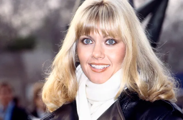 Olivia Newton-John smiles in London, England, 1978.