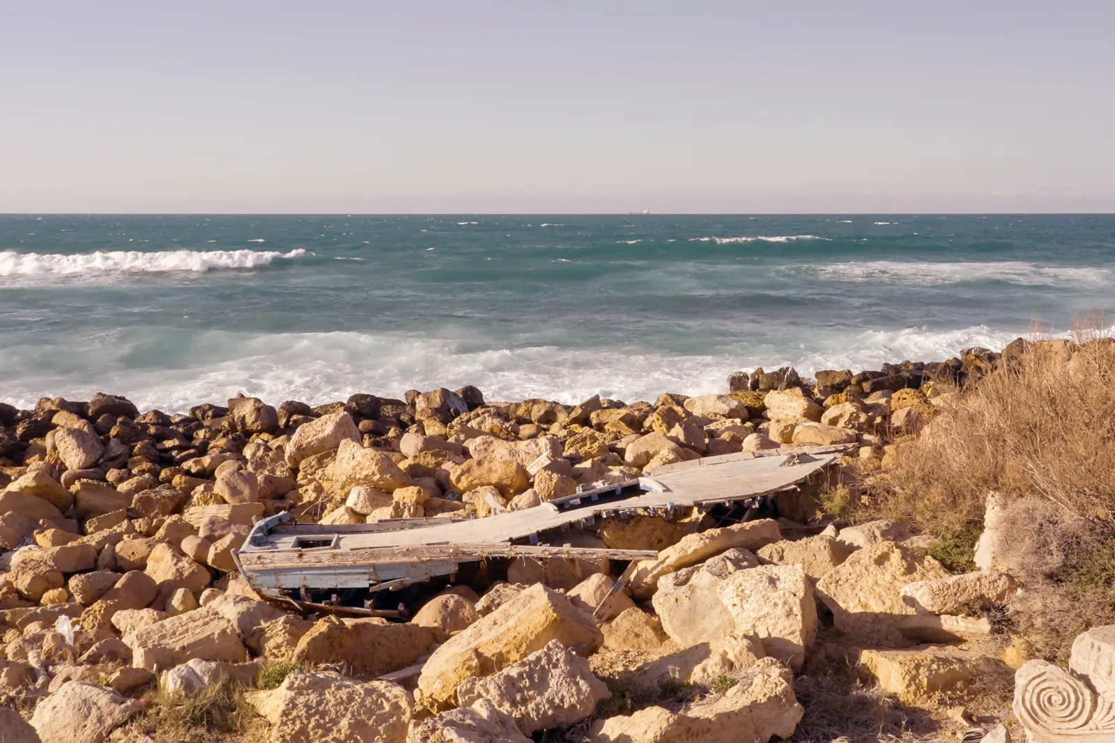 Lives LostA clandestine boat washed ashore in Khoms on April 7. As of May 9, 6,070 migrants had been intercepted and returned to Libya, with 821 missing or dead, according to the International Organization for Migration.