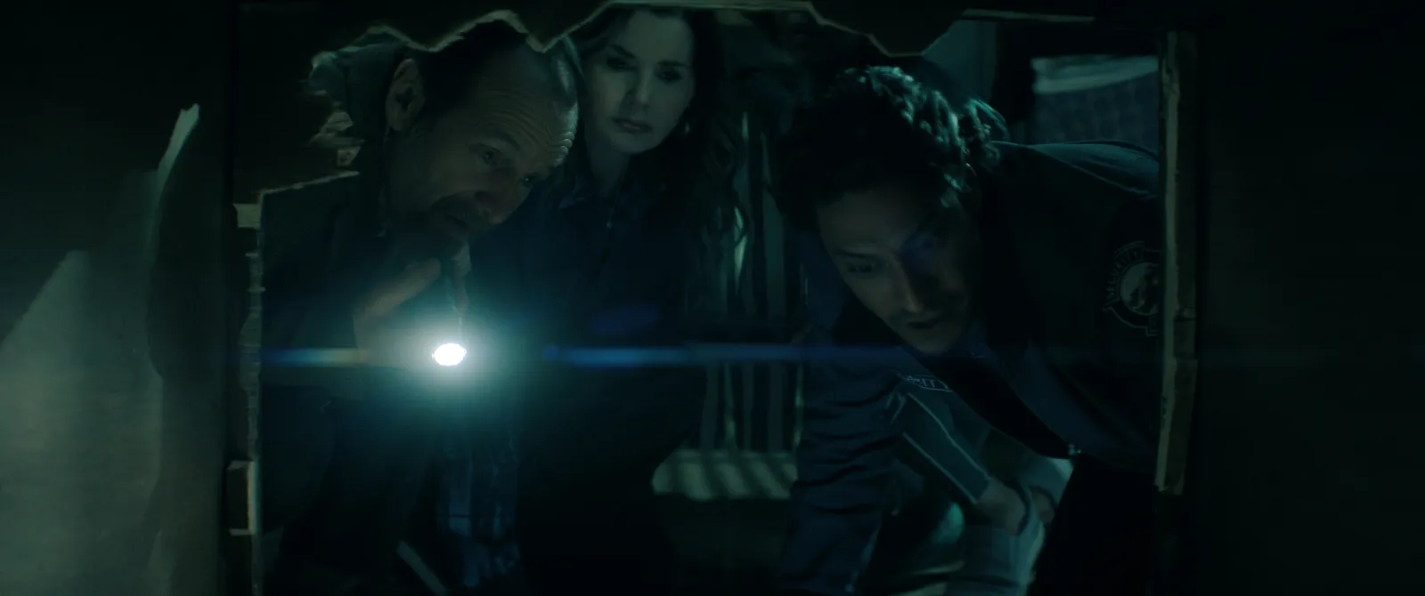 The Boroughs. (L to R) Denis O’Hare as Wally, Geena Davis as Renee, Carlos Miranda as Paz Navarro in The Boroughs. Cr. Courtesy of Netflix © 2026