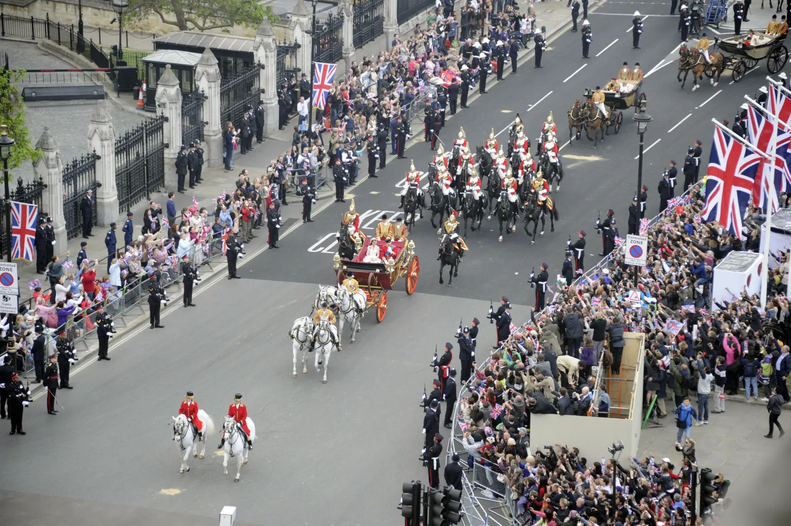 Prince William and Kate Middleton are seen in the 1902 State Landau carriage in London on April 29, 2011.
