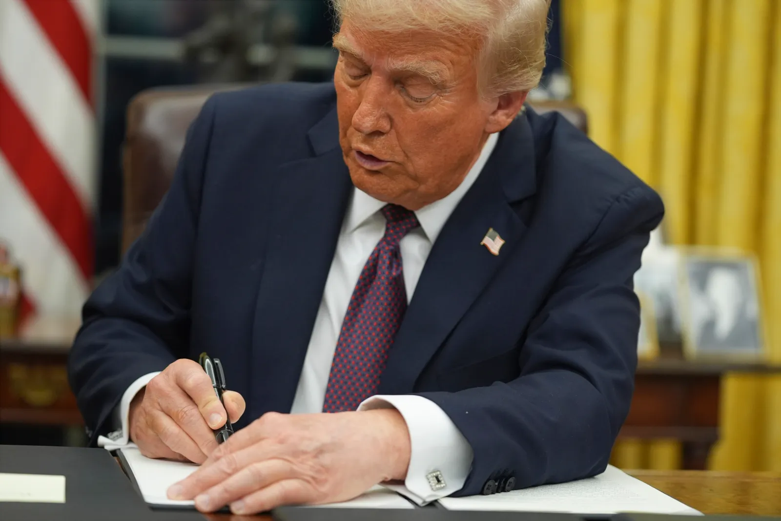 President Donald Trump signs an executive order on birthright citizenship in the Oval Office of the White House, on January 20, 2025, in Washington. (AP Photo/Evan Vucci)