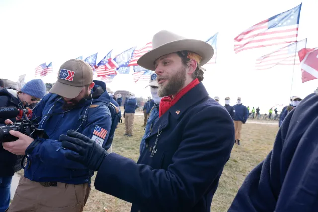Thomas Ryan Rousseau (C) and members of Patriot Front rally in Washington, D.C., on January 24, 2025.