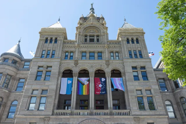LGBTQ+ flags fly at the Salt Lake City and County building on May 7, 2025.