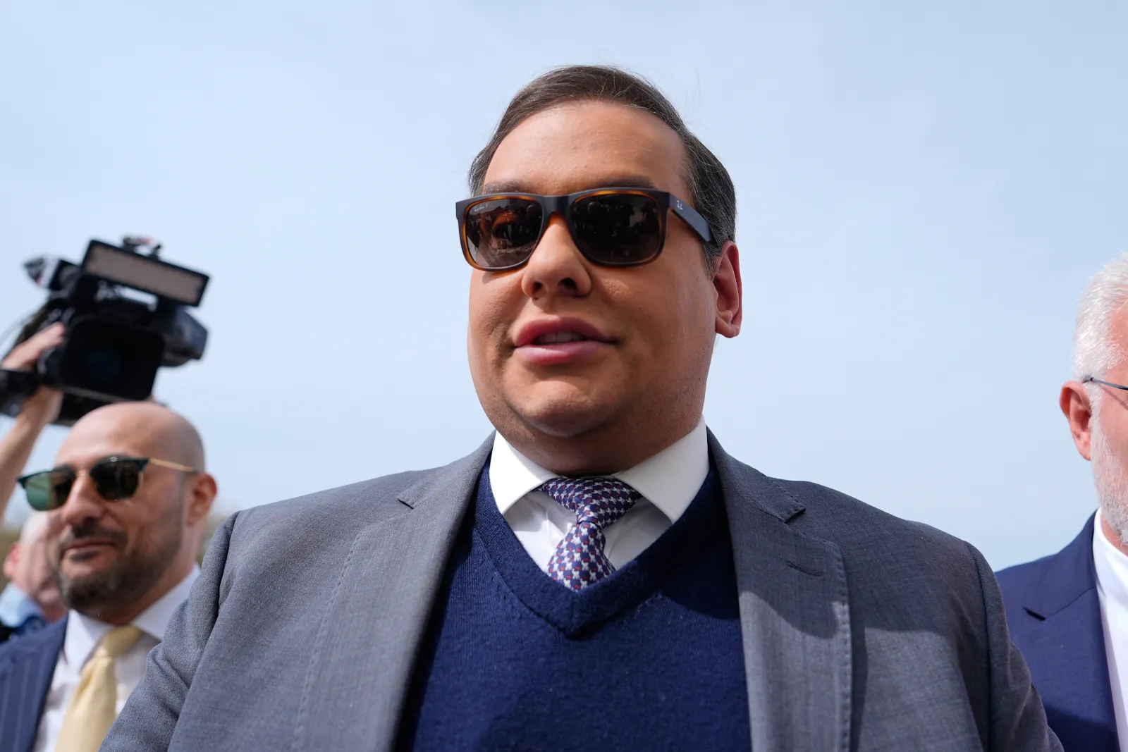 Former Representative George Santos arrives at federal court in Central Islip, New York, on April 25, 2025.