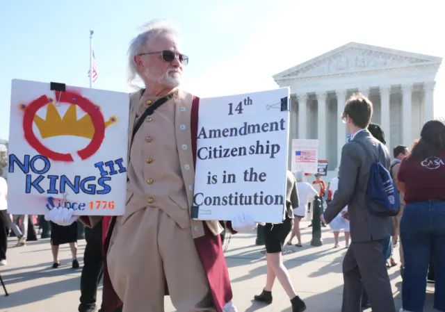 Pro and anti-Trump demonstrators rally outside the U.S. Supreme Court, before justices hear oral arguments on whether President Donald Trump can deny citizenship to children born to parents who are in the United States illegally or temporarily, on Capitol Hill in Washington on April 1. (AP Photo/J. Scott Applewhite)