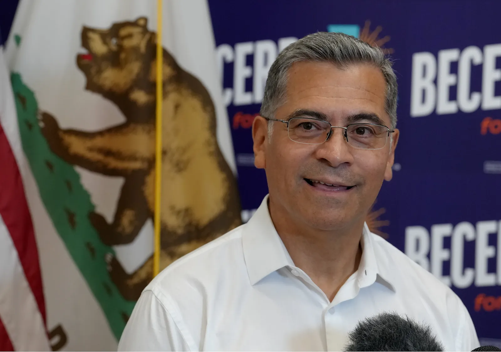 California gubernatorial candidate Xavier Becerra speaks with reporters after appearing at a town hall meeting in Sacramento on May 11. (AP Photo/Rich Pedroncelli)