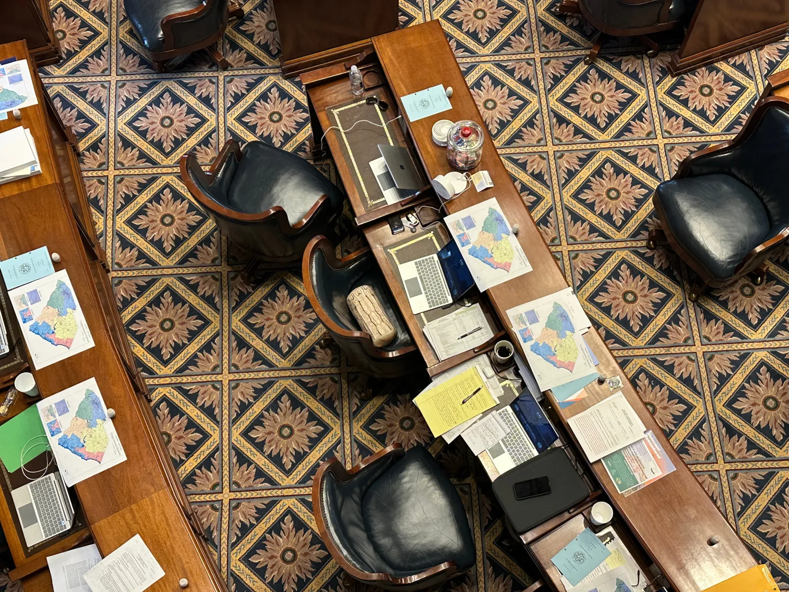 A new suggested map for South Carolina congressional districts sits on senators' desks on May 21 in Columbia, South Carolina. (AP Photo/Jeffrey Collins)