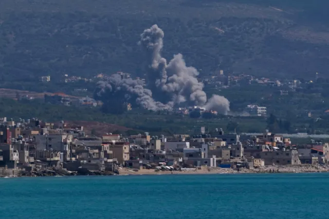 Smoke rises from an Israeli airstrike that hit Qlaileh village, as seen from the southern port city of Tyre, Lebanon, on June 2.