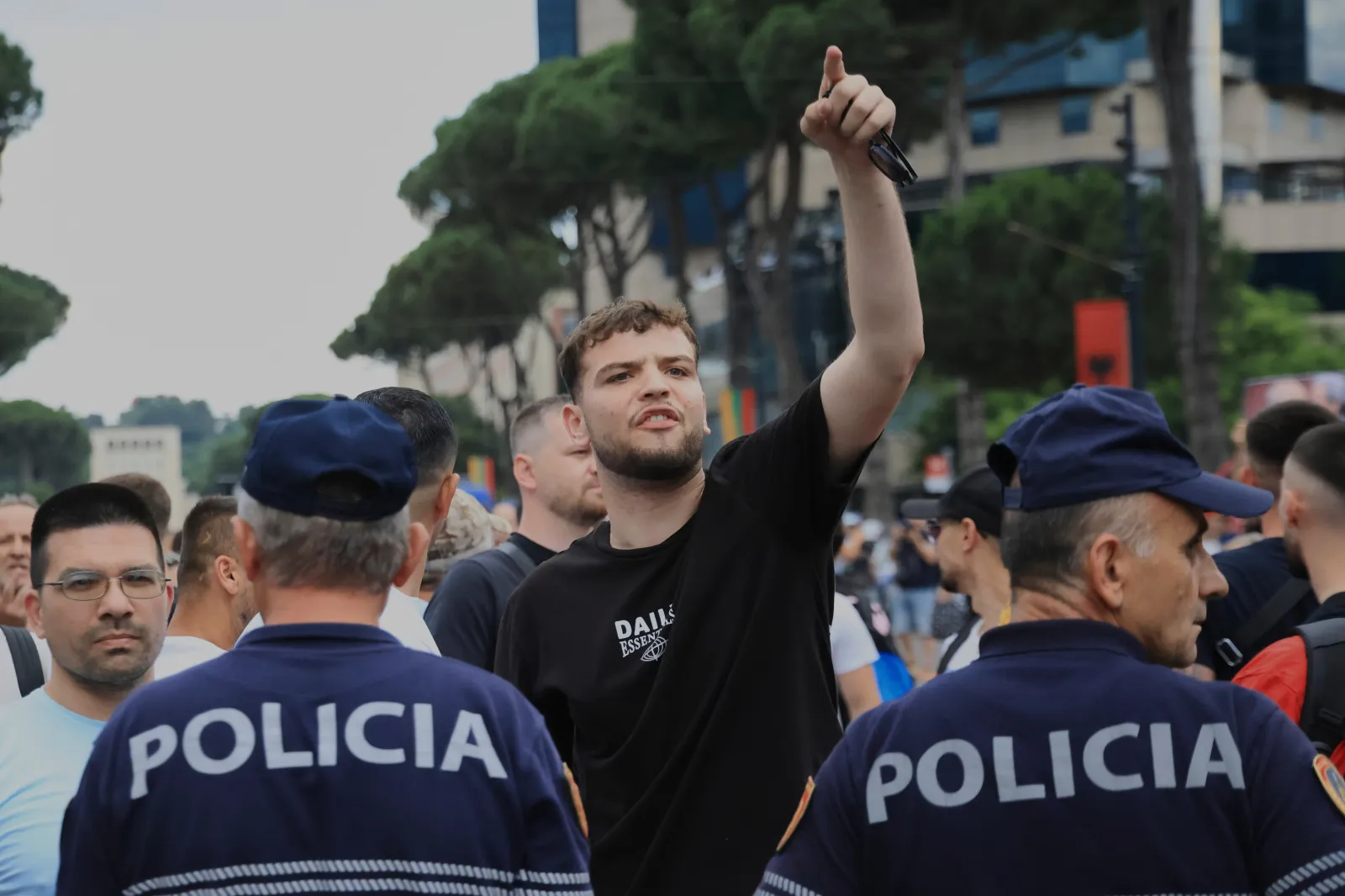 Police officers block a street during a demonstration in Tirana, Albania, on Wednesday, June 3, 2026, opposing a luxury coastal development project linked to Jared Kushner and Ivanka Trump over concerns about environmental impacts and transparency. (AP Photo/Hameraldi Agolli)