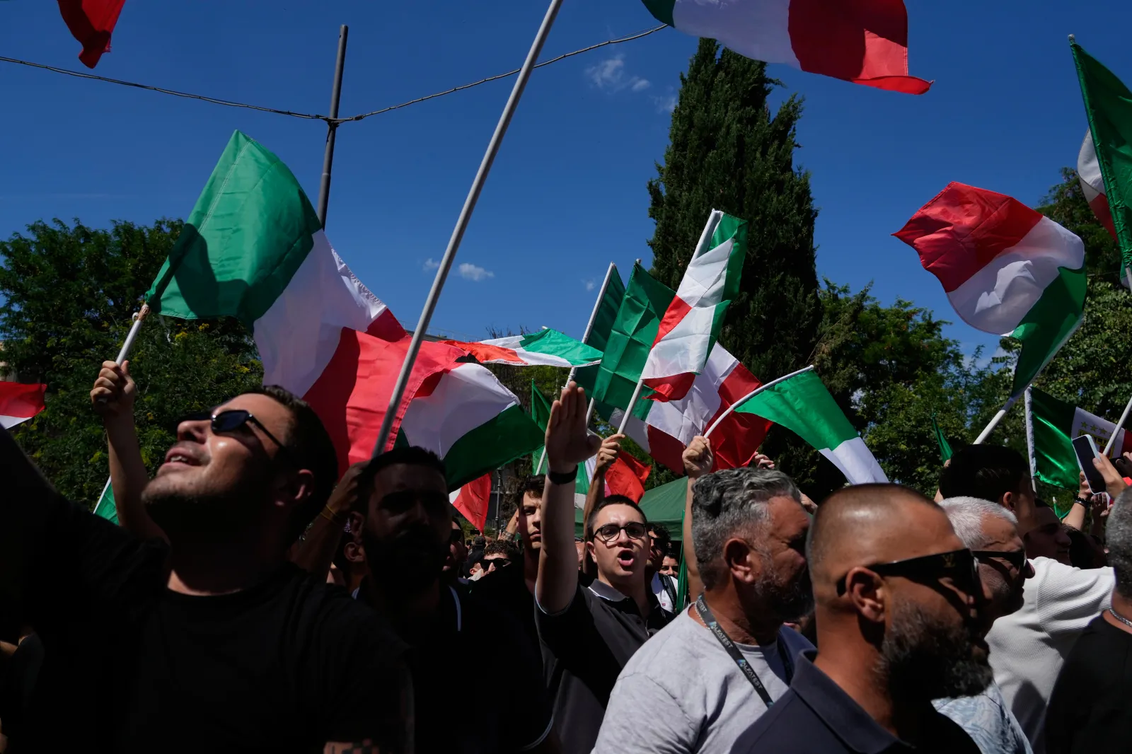 Demonstrators shout slogans as they gather during a protest organized by right-wing groups, calling for the repatriation of migrants, in Rome on June 13. (AP Photo/Gregorio Borgia)