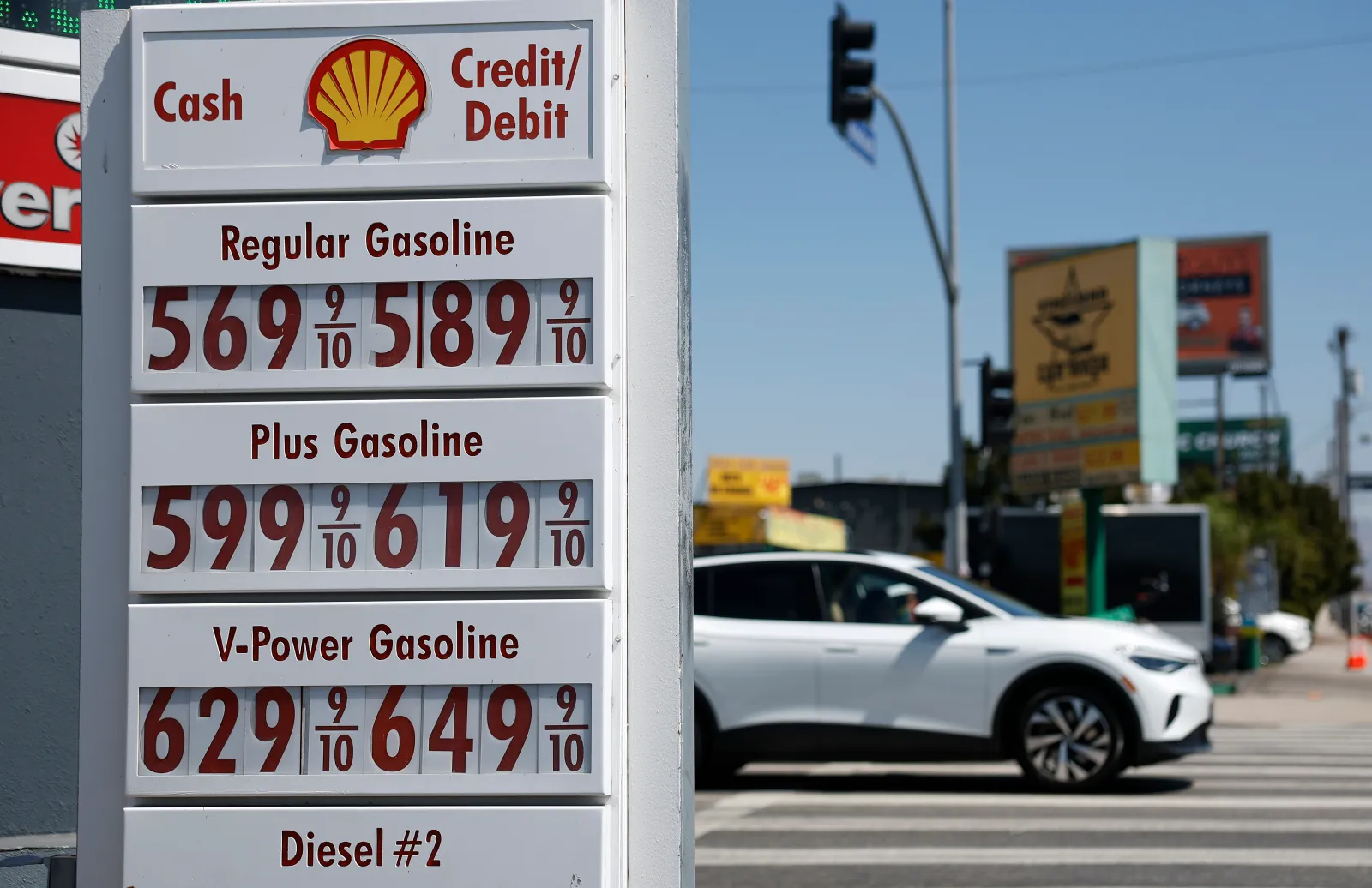 Gas prices are displayed at a Shell gas station on June 22 in Los Angeles.