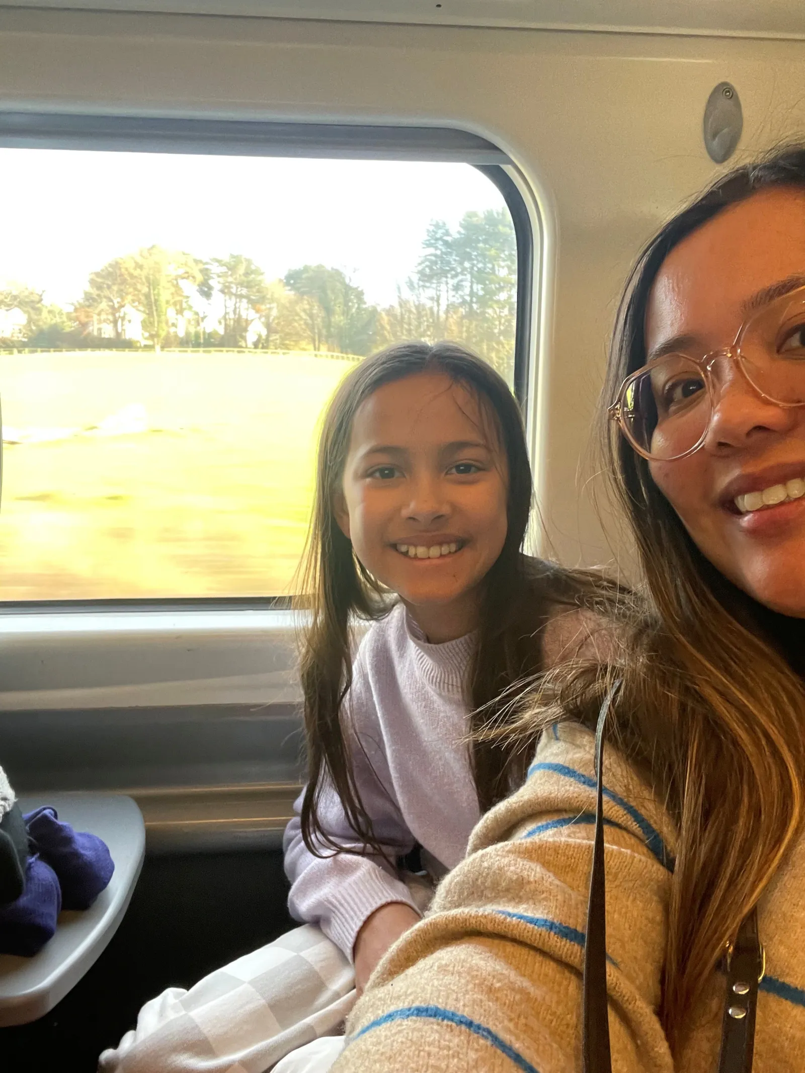 Cinelle-and-daughter-on-train-between-London-and-Manchester.jpg?w=1600&quality=80&webp=1