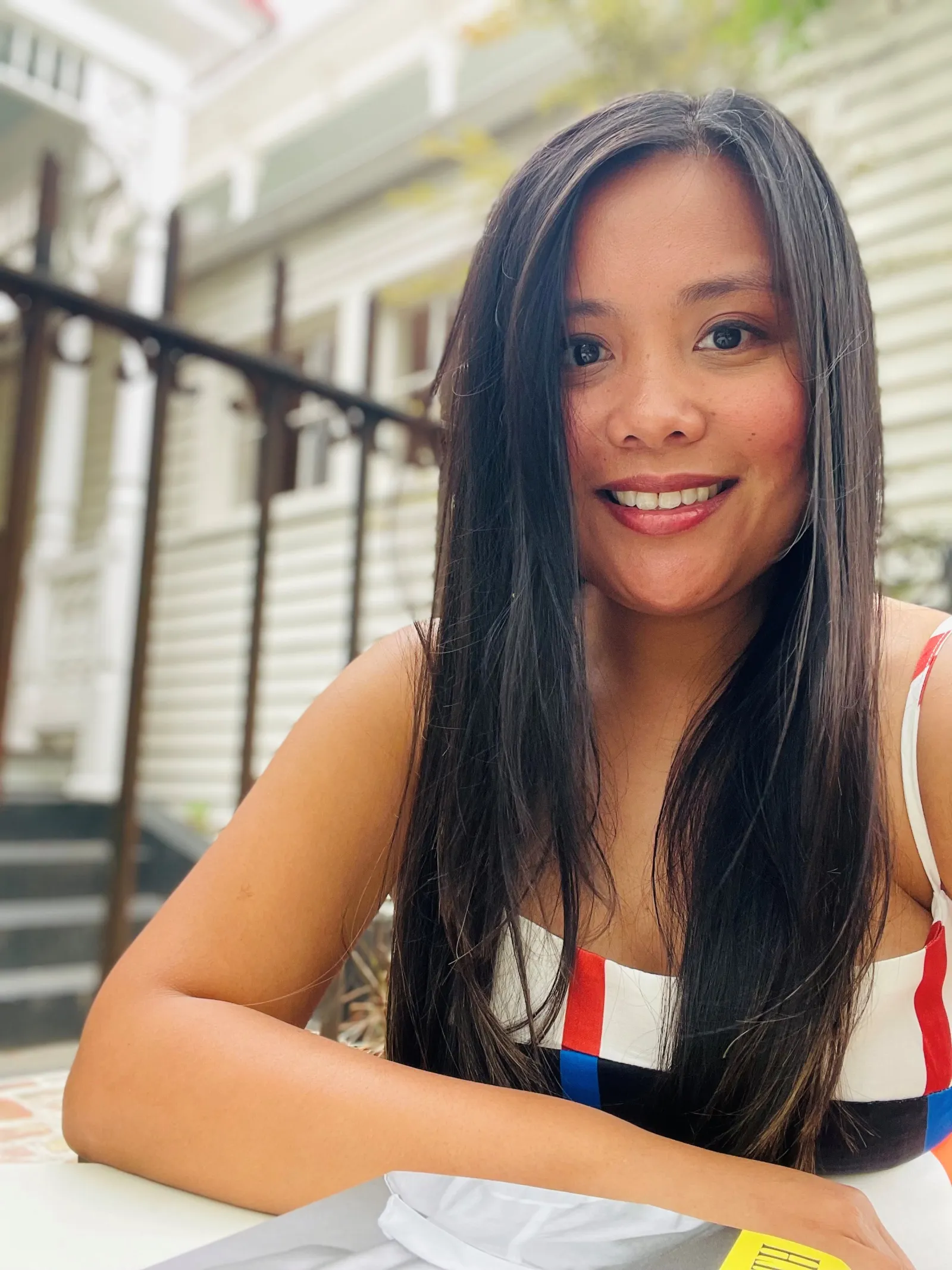 Barnes in her home city of Charleston, South Carolina, at a cafe outside a historic building.