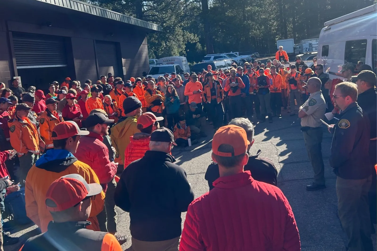 Rescuers gather in California during search efforts for missing hiker Jason Coughran.
