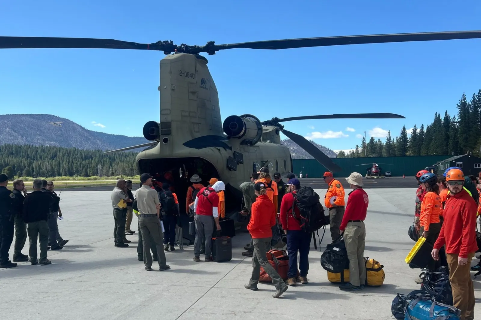 Hundreds of rescuers are scouring California’s rugged Desolation Wilderness for missing hiker Jason Coughran, who went missing in late May.