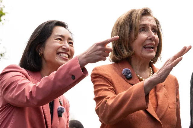 Congressional candidate Connie Chan and U.S. Rep. Nancy Pelosi (D-CA) stand at a