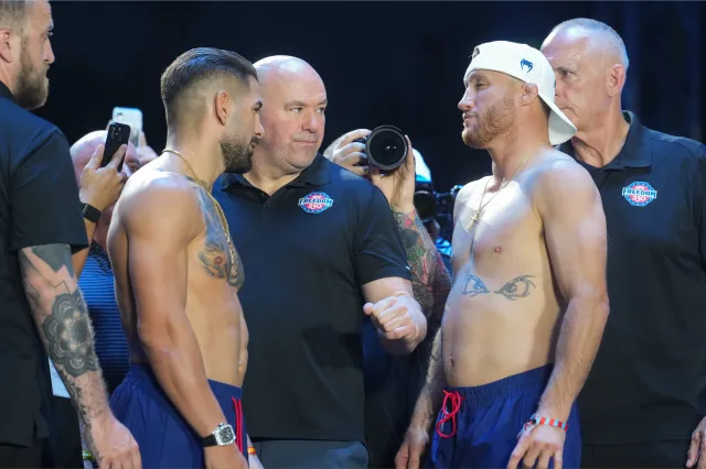 UFC lightweight fighters Ilia Topuria and Justin Gaethje face off during the ceremonial weigh-in during the UFC Freedom 250 Fan Fest on The Ellipse ahead of the upcoming UFC Freedom 250 fight on the South Lawn of the White House in Washington, DC. | Getty Images