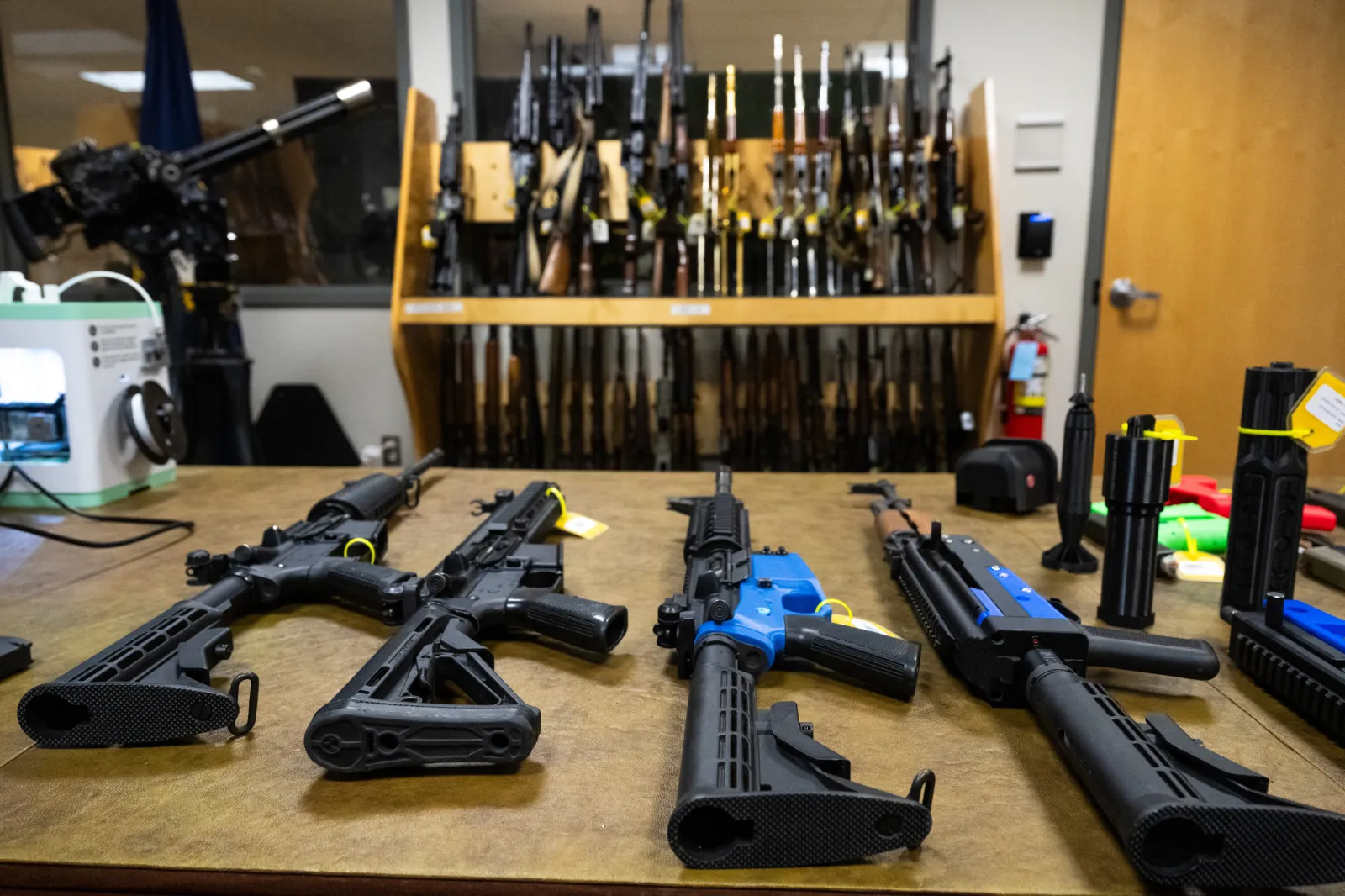 Rows of semi-automatic and fully automatic firearms, including some that were modified using 3D printed parts, are seen in the National Firearm Reference Vault in Martinsburg, West Virginia, September 4, 2024 | Getty Images