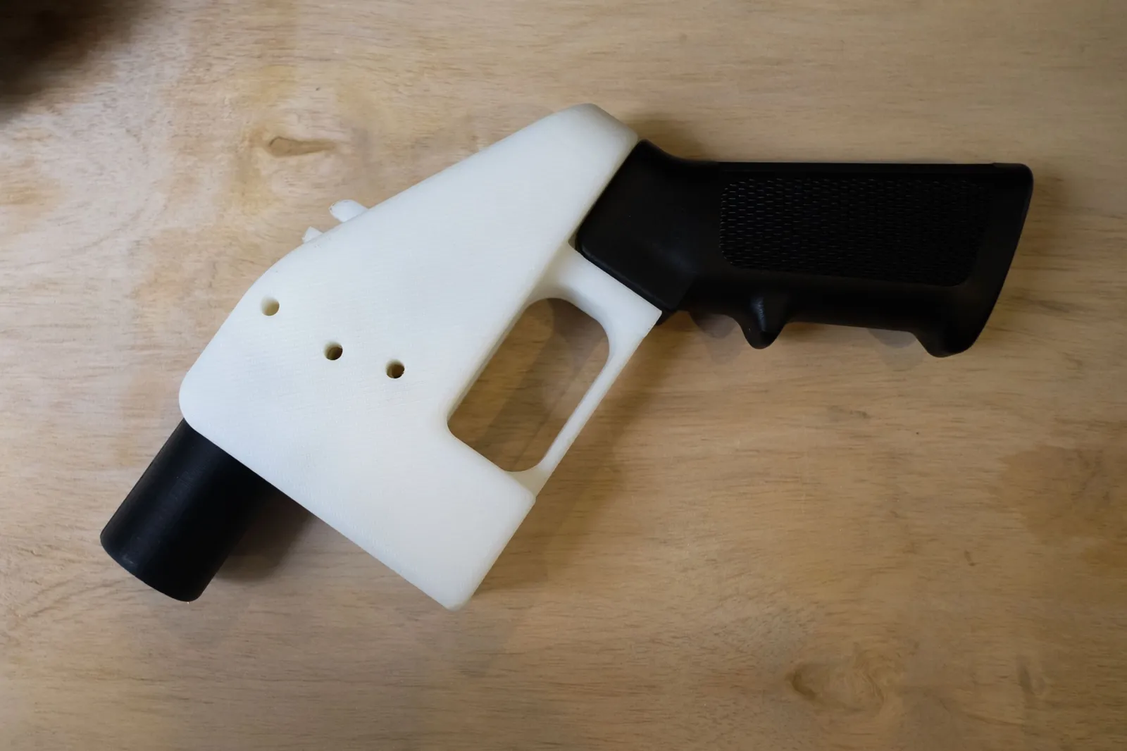 A 3D printed gun, called the "Liberator", is seen in a factory in Austin, Texas on August 1, 2018 | Getty Images