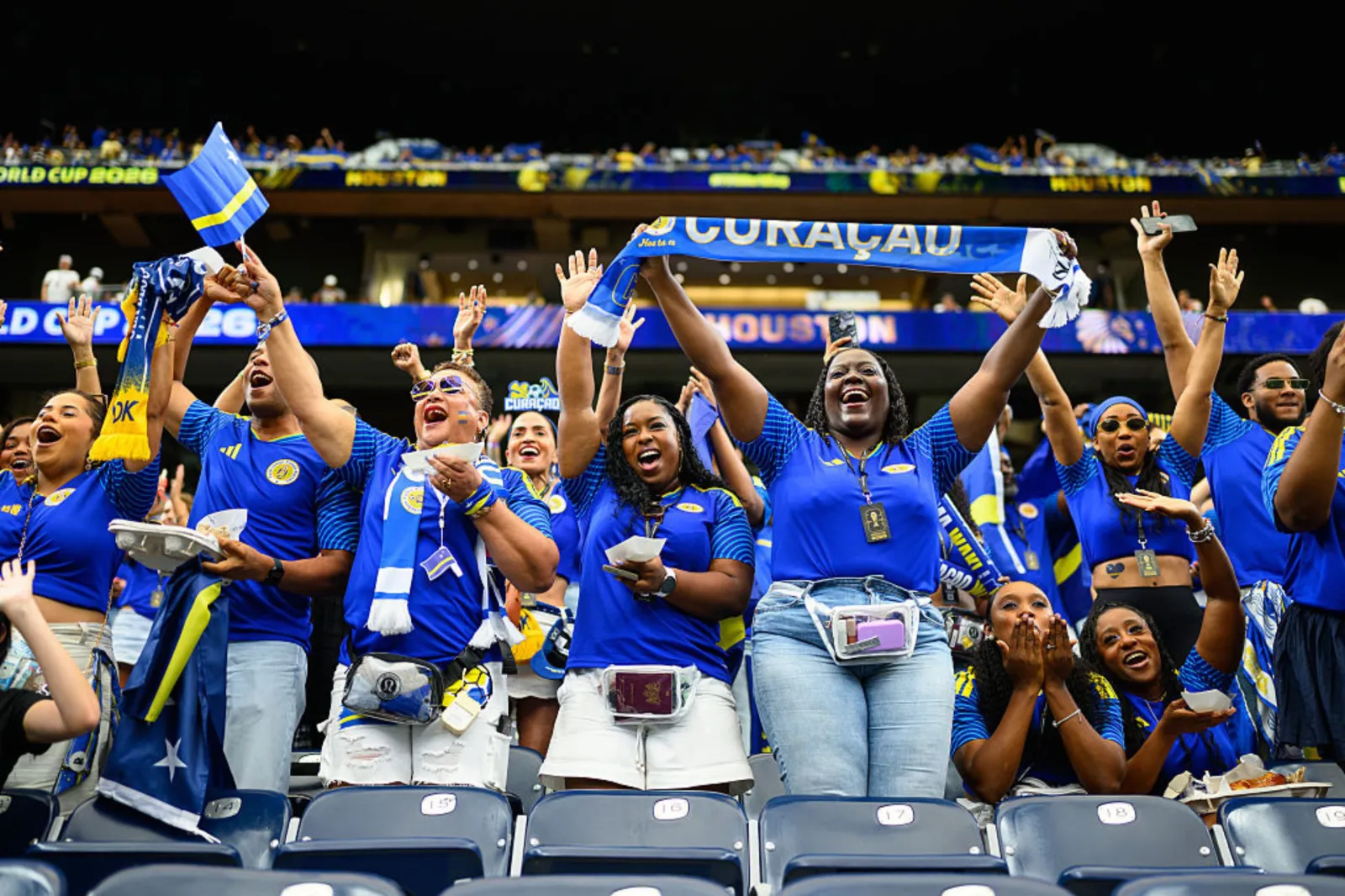 Fans of Curacao celebrate prior to the FIFA World Cup 2026 Group E match between Germany and Curacao at Houston Stadium on June 14, 2026, in Houston, Texas.