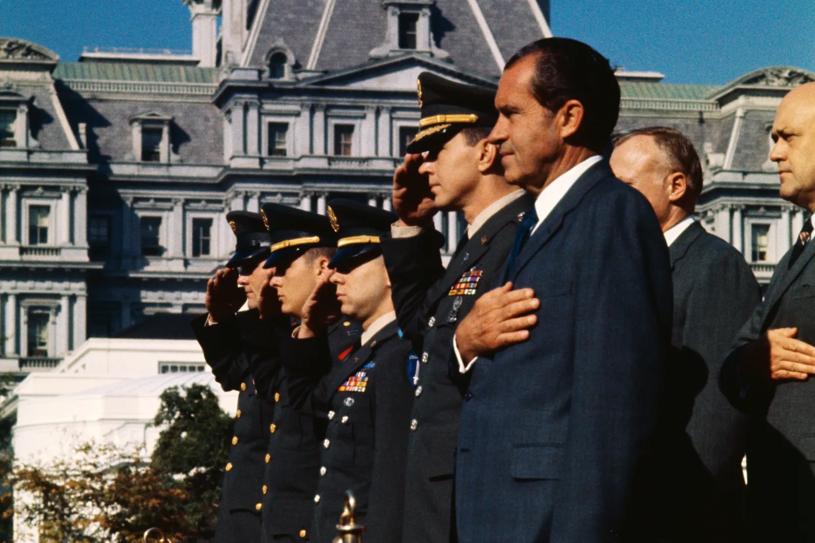 Original Caption) Washington. In a ceremony at the White house October 9th, President Nixon presented the Medal of Honor to four Army men for bravery in the Vietnam War. Left to right: Sgt. Robert M. Patterson, 21, Fayetteville, North Carolina; Captain James Sprayberry, 22, Sylacauga, Alabama; Captain Jack H. Jacobs, 24, Fords, New Jersey; and Majority Patrick H. Brady, 33, Ft. Sam Houston, Texas. (the President stands in front of them or alongside.)