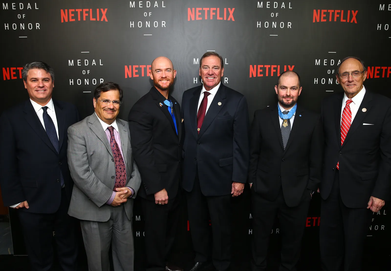 WASHINGTON, DC - NOVEMBER 13: (L-R) Producer Adam Del Deo, Rep. Gus Michael Bilirakis (R-FL), Medal of Honor Recipient Staff Sgt. Ty Carter, Rep. Neal Dunn (R-FL), Medal of Honor Recipient Staff Sgt. Ron Shurer, and Rep. Phil Roe (R-TN) at the Netflix 'Medal of Honor' screening and panel discussion moderated by Meghan McCain at the US Navy Memorial Burke Theater on November 13, 2018 in Washington, DC.