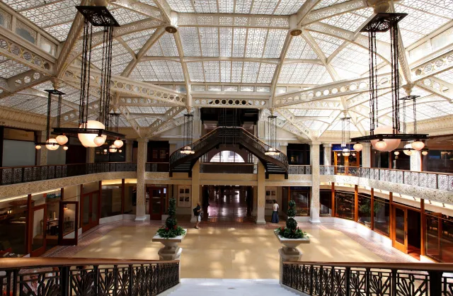 An overview of The Rookery's central light court and lobby, pictured here in 2013, remodeled in 1905 by Frank Lloyd Wright.