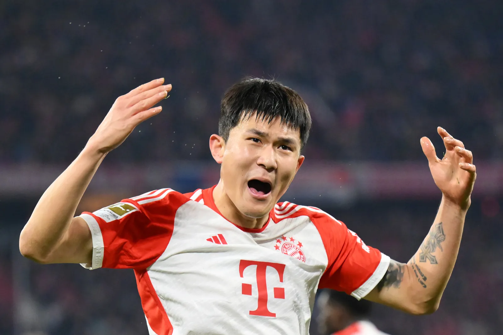 Kim Min-Jae of Bayern Munich reacts during the Bundesliga match between FC Bayern München and VfB Stuttgart at Allianz Arena on December 17, 2023 in Munich, Germany. (Photo by Sebastian Widmann/Getty Images)