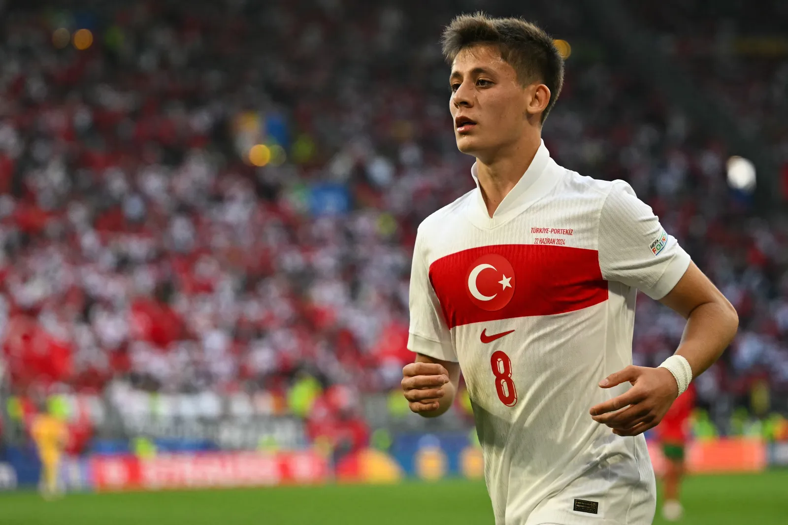 TOPSHOT - Turkey's forward #08 Arda Guler runs during the UEFA Euro 2024 Group F football match between Turkey and Portugal at the BVB Stadion in Dortmund on June 22, 2024. (Photo by OZAN KOSE / AFP) (Photo by OZAN KOSE/AFP via Getty Images)