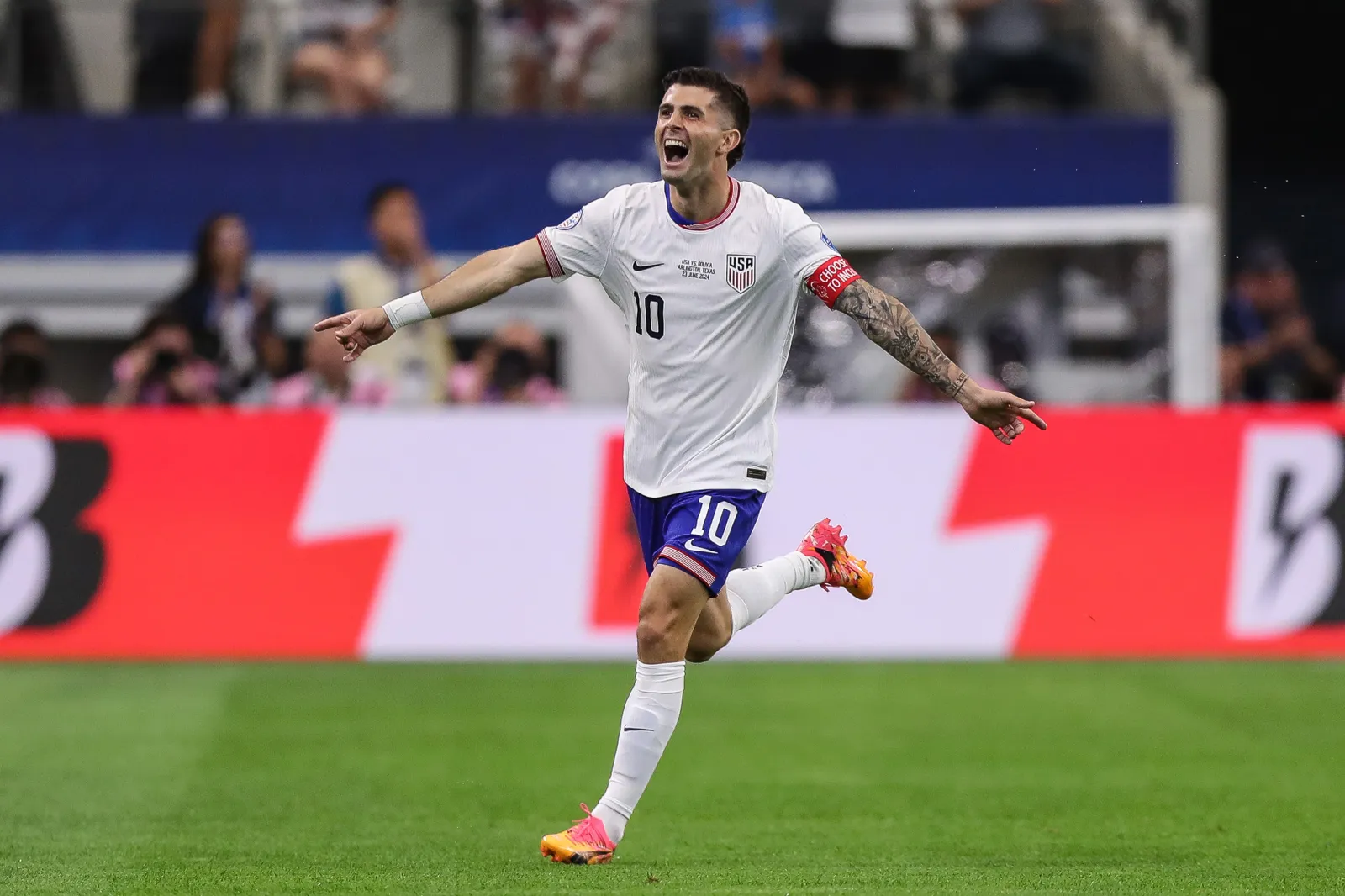 ARLINGTON, TEXAS - JUNE 23: Christian Pulisic of United States celebrates after scoring the team's first goal during the CONMEBOL Copa America 2024 Group C match between United States and Bolivia at AT&T Stadium on June 23, 2024 in Arlington, Texas. (Photo by Omar Vega/Getty Images)