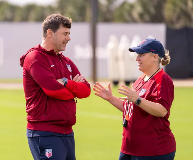 Mauricio Pochettino and Emma Hayes talk on the field during USWNT training on January 19, 2025, at Florida Blue Training Center in Fort Lauderdale, Florida.