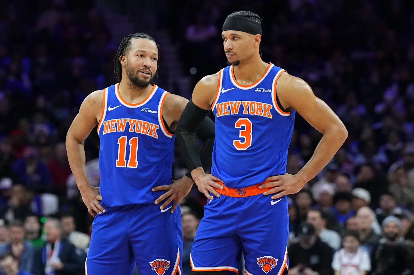 PHILADELPHIA, PENNSYLVANIA - JANUARY 15: Jalen Brunson #11 and Josh Hart #3 of the New York Knicks look on against the Philadelphia 76ers at the Wells Fargo Center on January 15, 2025 in Philadelphia, Pennsylvania. The Knicks defeated the 76ers 125-119 in overtime. (Photo by Mitchell Leff/Getty Images)