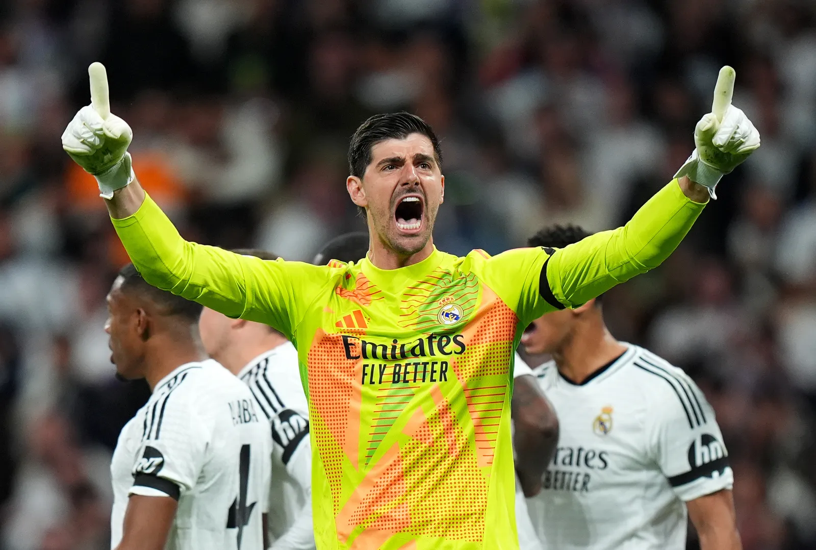 MADRID, SPAIN - APRIL 16: Thibaut Courtois of Real Madrid celebrates after saving a penalty kick from Bukayo Saka of Arsenal during the UEFA Champions League 2024/25 Quarter Final Second Leg match between Real Madrid C.F. and Arsenal FC at Estadio Santiago Bernabeu on April 16, 2025 in Madrid, Spain. (Photo by Angel Martinez/Getty Images)