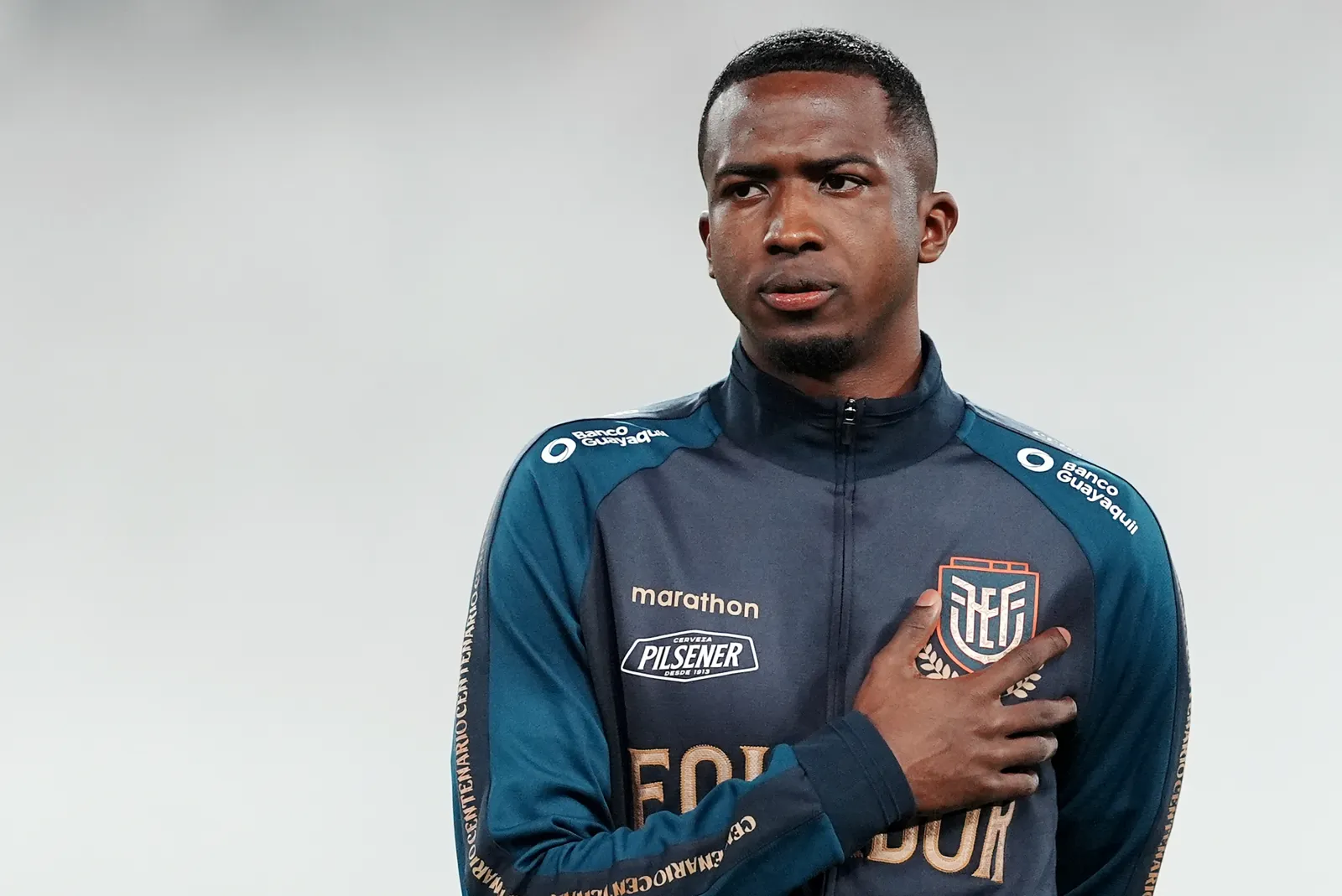 LIMA, PERU - JUNE 10: Willian Pacho of Ecuador sings the national anthem prior the FIFA World Cup 2026 South American Qualifier match between Peru and Ecuador at Estadio Nacional de Lima on June 10, 2025 in Lima, Peru. (Photo by Raul Sifuentes/Getty Images)