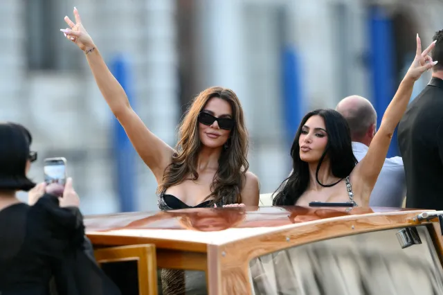 Khloe (L) Kim Kardashian (R) in Venice, Italy for the Bezos wedding on June 26, 2025.