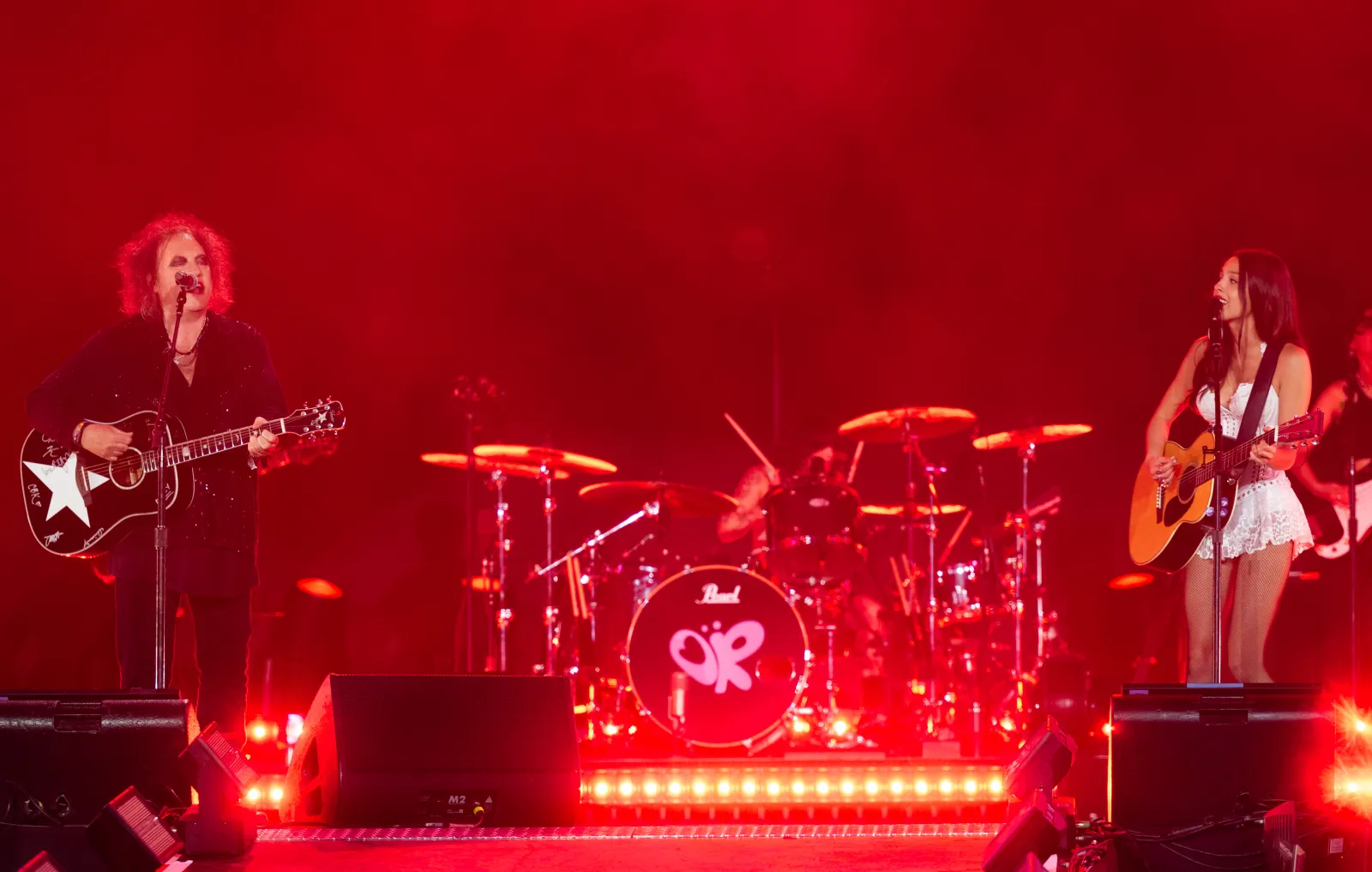 Olivia Rodrigo performs with Robert Smith
