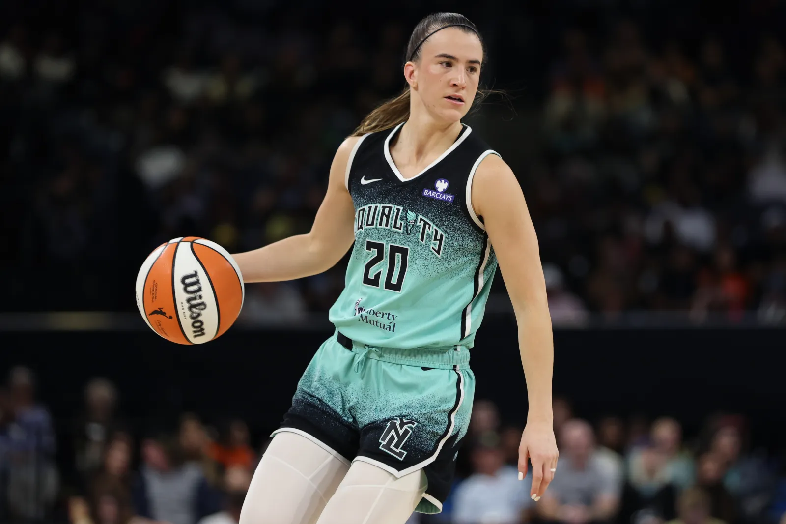 Sabrina Ionescu #20 of the New York Liberty dribbles the ball during the second half of the game against the Chicago Sky at Wintrust Arena on September 11, 2025 in Chicago, Illinois. (Photo by Michael Hirschuber/Getty Images)