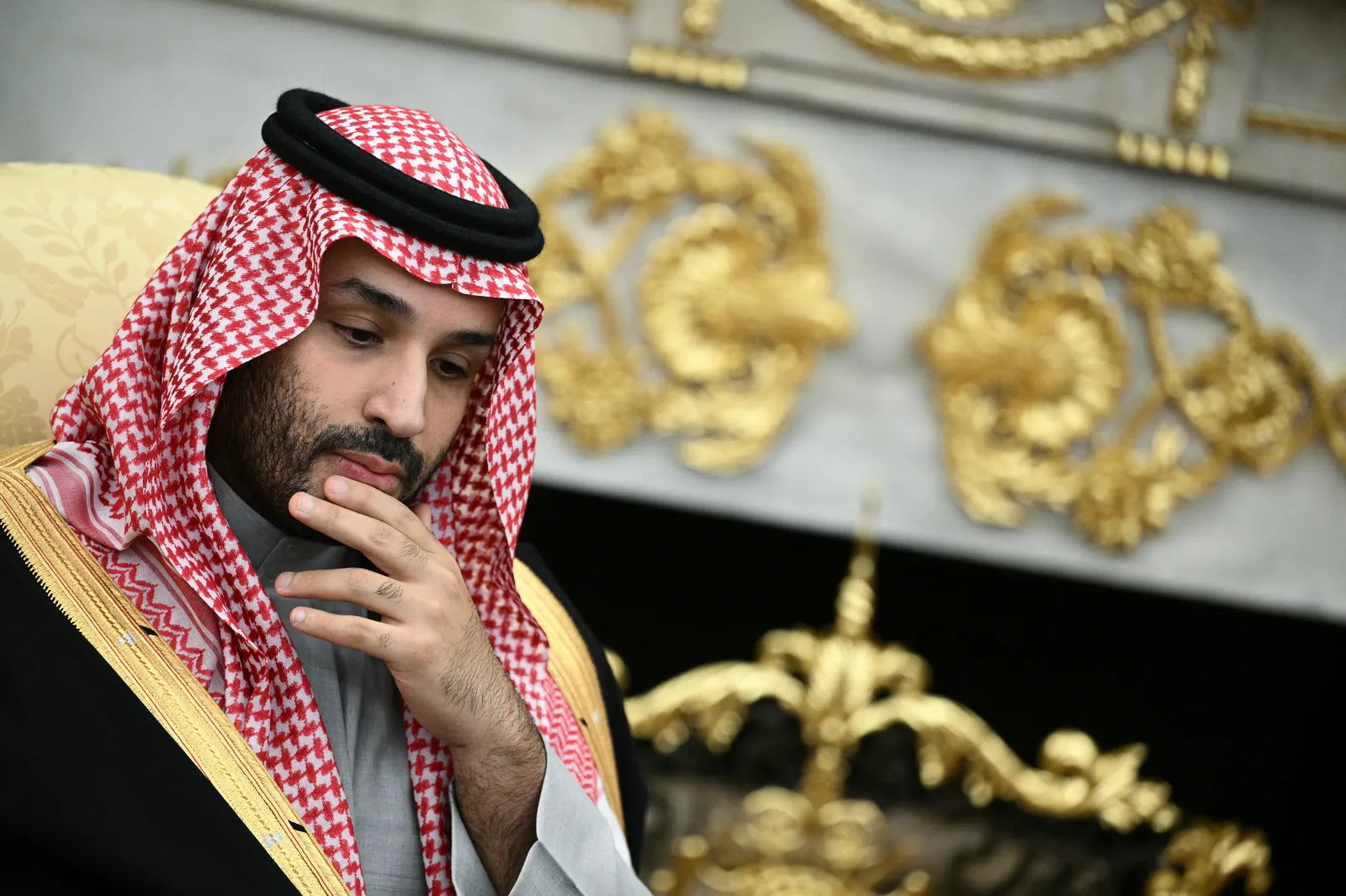 Crown Prince and Prime Minister of the Kingdom of Saudi Arabia Mohammed bin Salman looks on during a meeting with U.S. President Donald Trump (not pictured) in the Oval Office of the White House in Washington, DC on November 18, 2025.