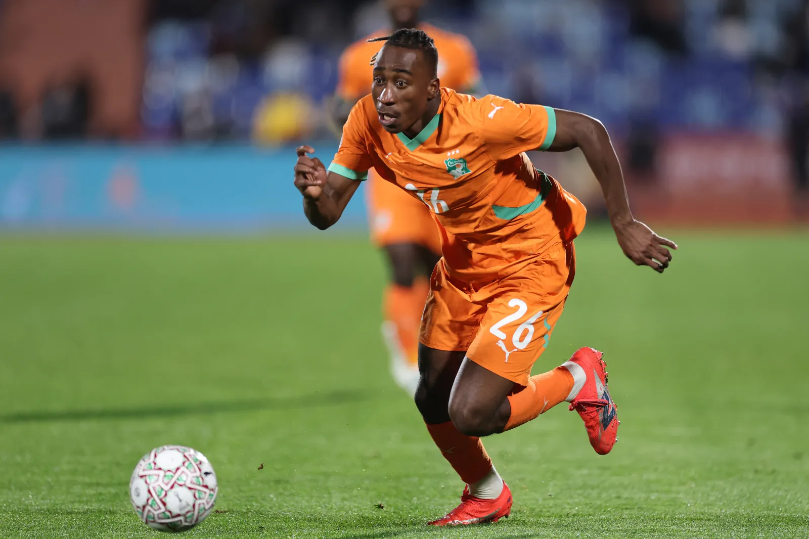 Ivory Coast's forward #26 Yan Diomande runs with the ball during the Africa Cup of Nations (CAN) round of 16 football match between Ivory Coast and Burkina Faso at the Grand Stadium in Marrakesh on January 6, 2026. (Photo by FRANCK FIFE / AFP via Getty Images)