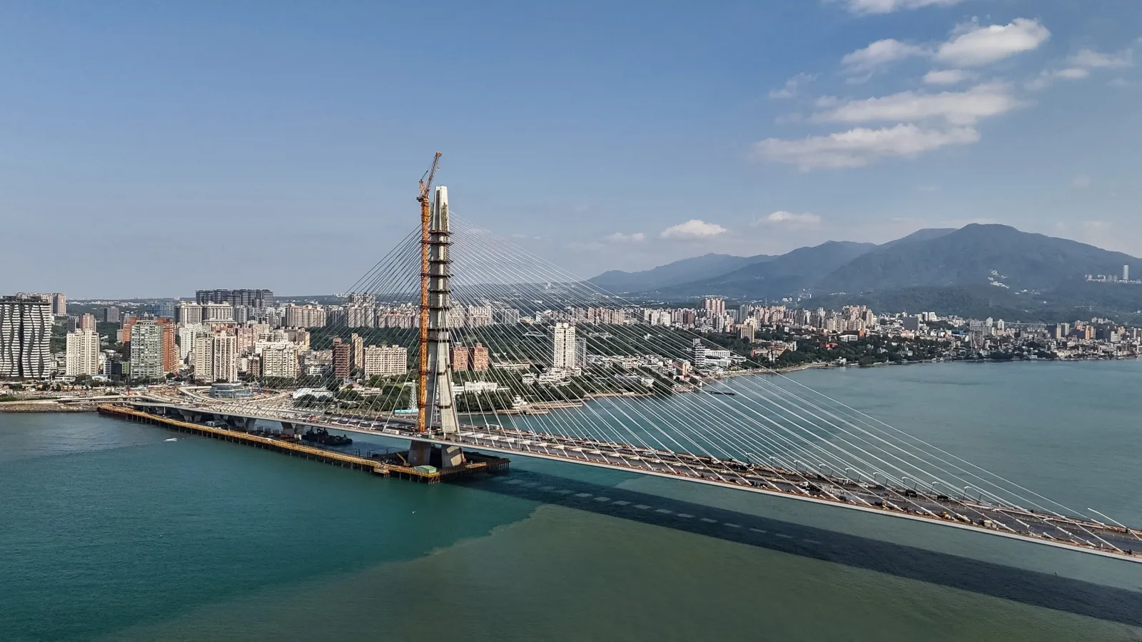 A view of the Danjiang Bridge under construction over the Tamsui River in January.