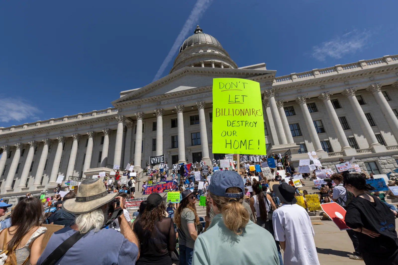 Protesters rally at the Utah State Capitol building to oppose the construction of a data center in Box Elder County on May 23, 2026.