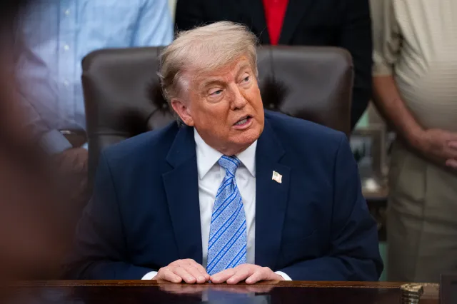 President Donald Trump speaks during an announcement with grocery-store owners about easing requirements on planet-warming refrigerants, in the Oval Office of the White House on May 21 in Washington, D.C.