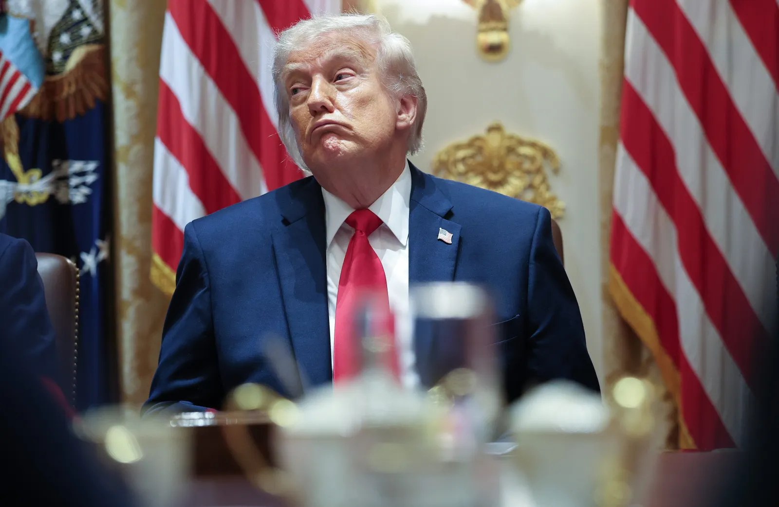 U.S. President Donald Trump listens to members of his Cabinet speak during a meeting in the Cabinet Room of the White House on May 27, 2026.