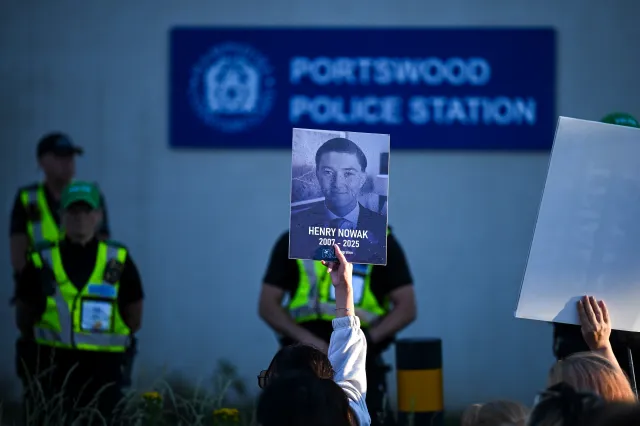 Protesters confront police at Portswood Police station near the location where Henry Nowak died, during a demonstration over the police's handling of the incident, on June 02, 2026 in Southampton, England.