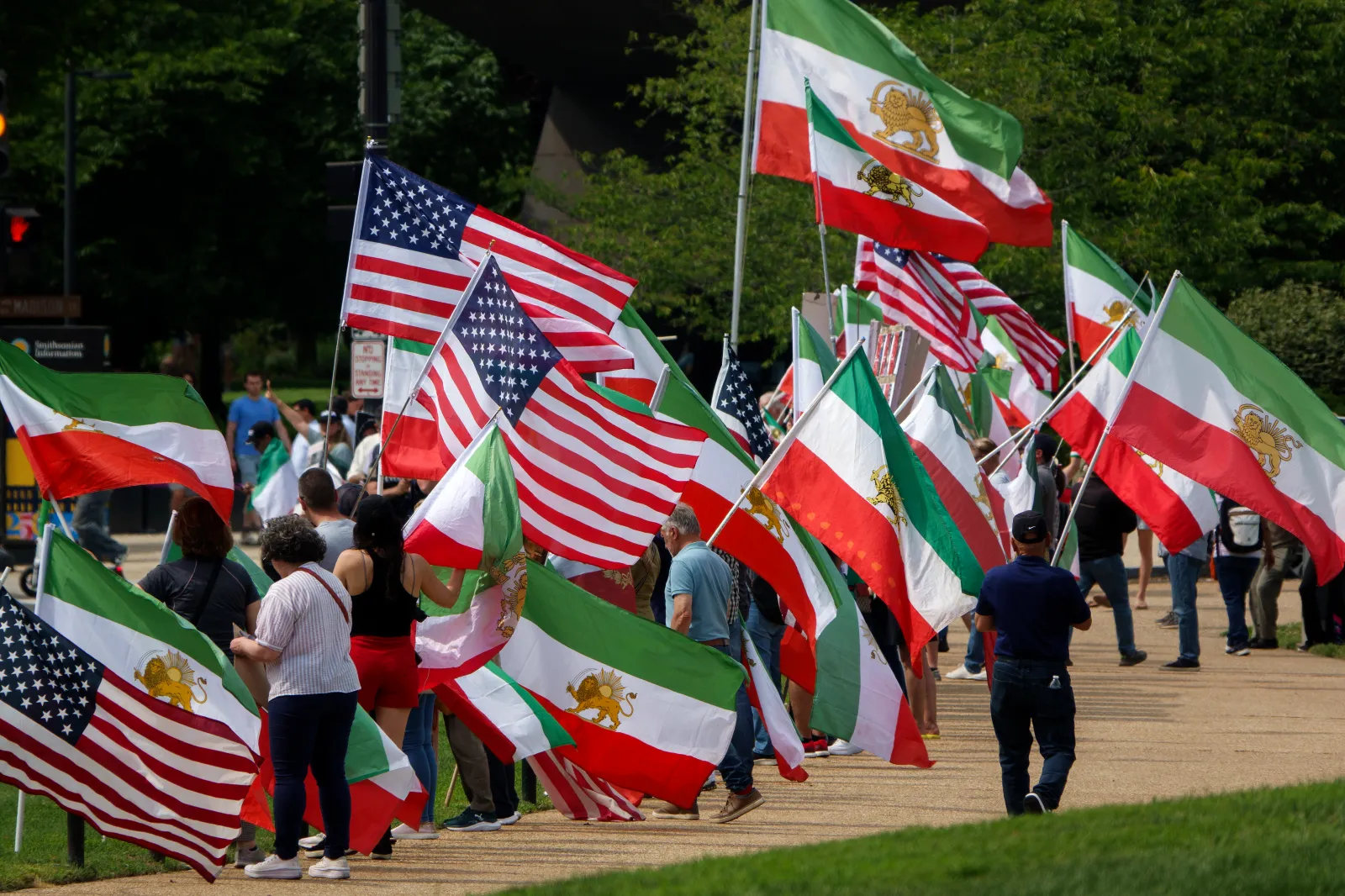 People gather along the National Mall to protest the Islamic regime and executions of Iranians on June 6, 2026, in Washington. (Photo by Kevin Carter/Getty Images)