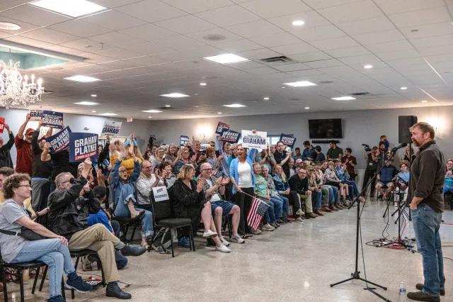 Democratic U.S. Senate candidate Graham Platner speaks to voters at a town hall at the Elks Lodge 188 on June 7 in Portland.