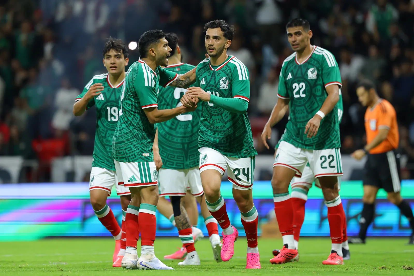Luis Chávez of Mexico celebrates with teammates after scoring the team's fifth goal during the international friendly match between Mexico and Serbia at Nemesio Diez Stadium on June 04, 2026 in Toluca, Mexico. (Photo by Agustin Cuevas/Getty Images)