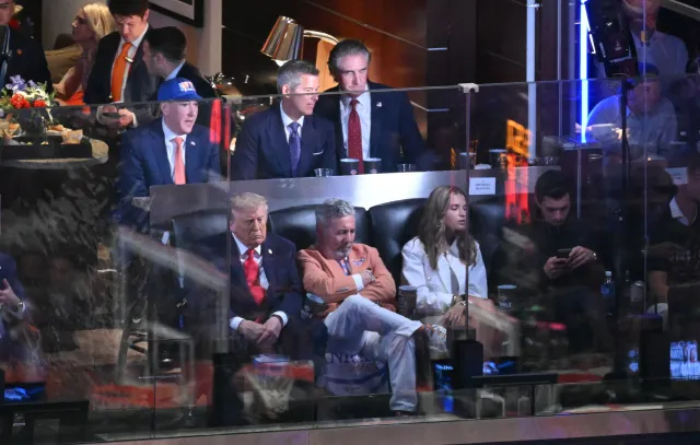 President Donald Trump sits next to New York Knicks owner James Dolan as they attend Game 3 of the NBA Finals against the San Antonio Spurs at Madison Square Garden in New York City on June 8, 2026.